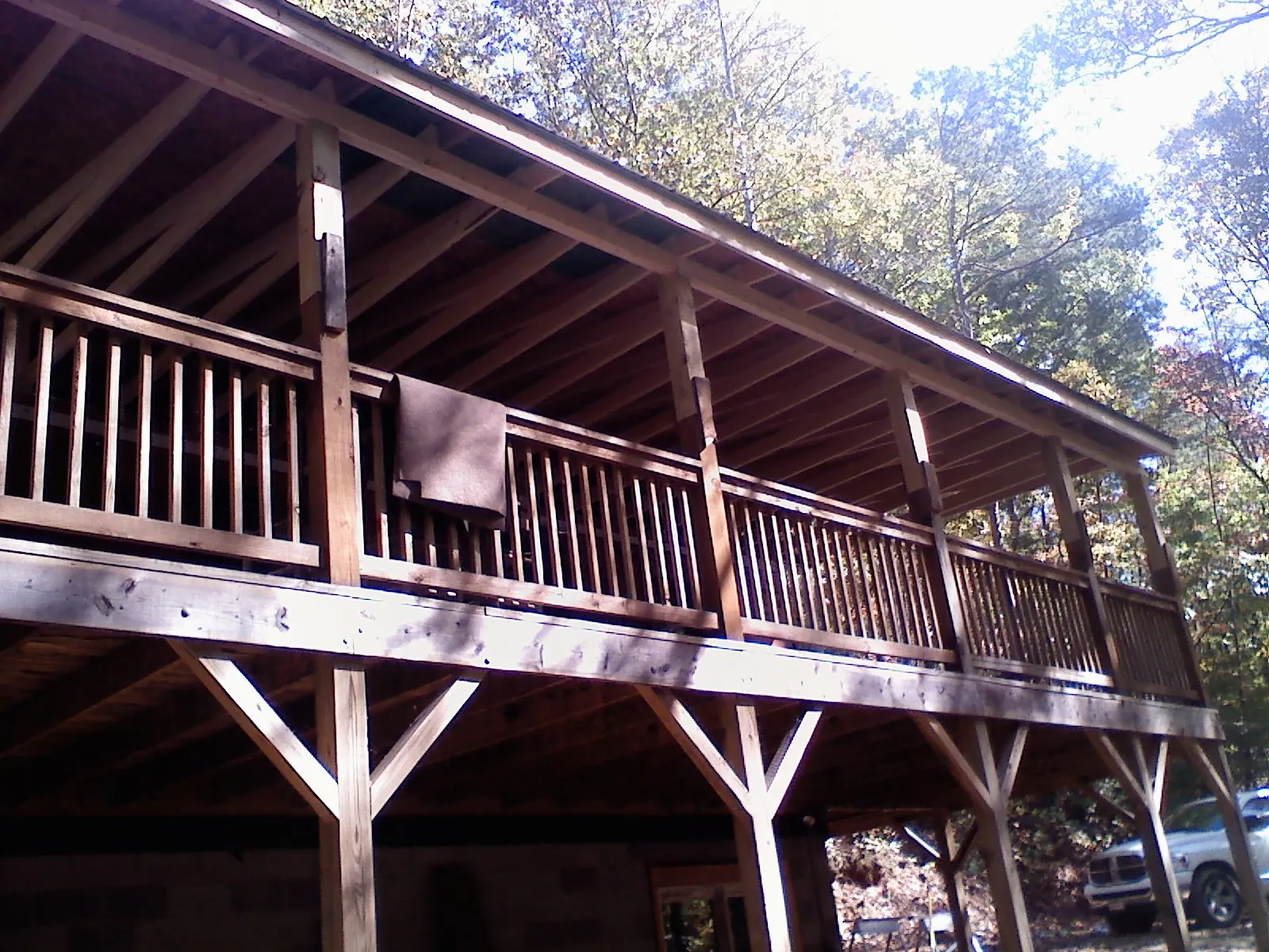 Timber framing under a new elevated porch and deck — Roof Leak Repair in Beavercreek by Roofing Brothers